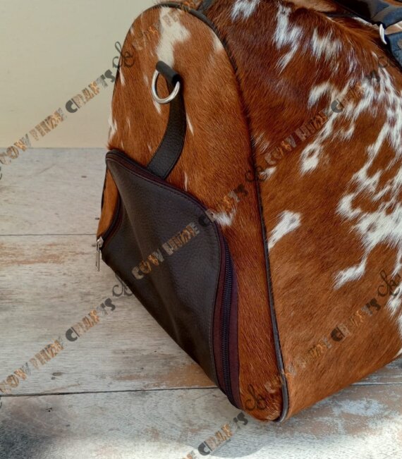 Leather shoe compartment duffle bag.